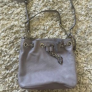 Used women’s Michael Kors lavender crossbody bucket bag